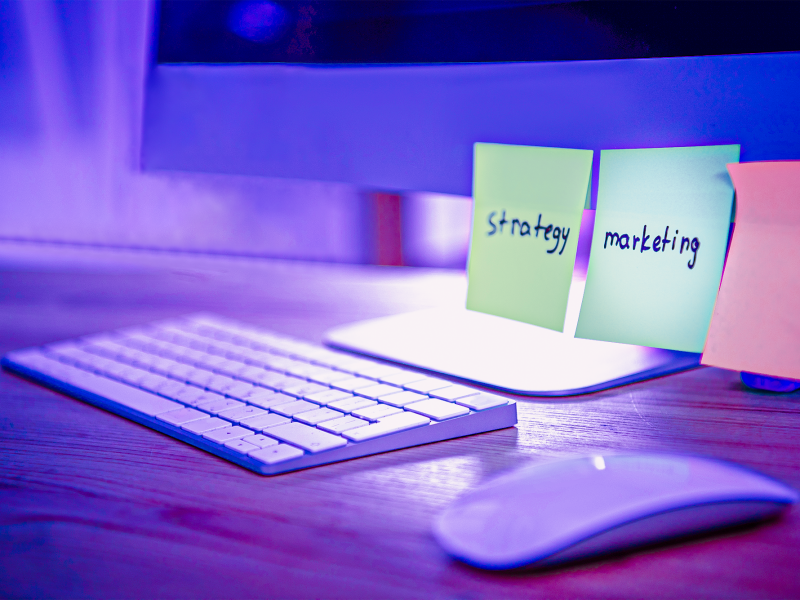 close-up-view-of-colorful-sticky-notes-with-market-6E3WAE33